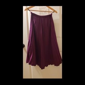 Long purple pleated skirt